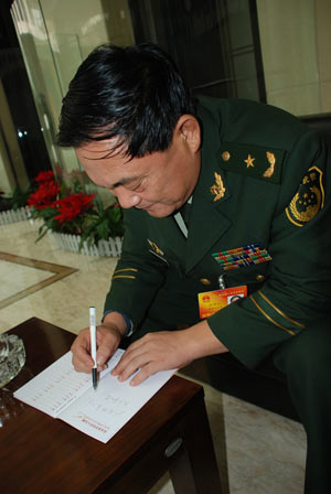 武警海南省总队总队长张明义:从四方面加强武警部队建设